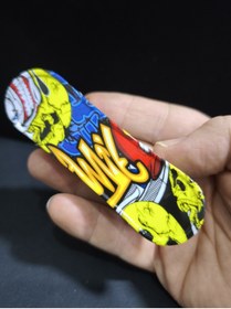 Resim enyatakı Kaykay modeli ızgaralı pürmüzlü alevli tamamı metal kaplama kaliteli tarz çakmak 