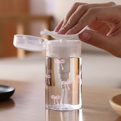 Resim 1 adet, Sevimli Fiyonk Baskı Desen Şeffaf PET Doldurulabilir Seyahat Şişesi ile 3.38oz / 6.76oz Taşınabilir Pompa Dağıtıcı, Oje Çözücü, Tonik ve Makyaj Temizleyici için Uygun, Yuvarlak Üst Tasarım, Sadece Elde Yıkama, Yeniden Kullanılabilir, Makyaj Temizleyici Su Şişesi 
