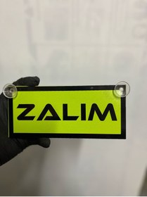 Resim HBSİ YEŞİL RENK ÜZERİ SİYAH RENK ZALIM YAZILI VANTUZLU CAM SÜSÜ 