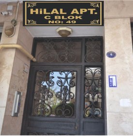 Resim Kurt Reklam Dünyası Apartman levhası 60x30 ebatların kompozit malzeme üzeri altın rengi gold folyo uygulama 