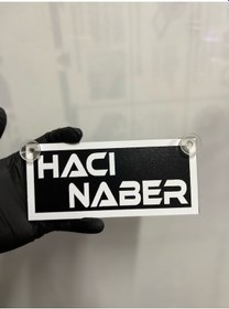 Resim Siyah Renk Üzeri Beyaz Renk Hacı Naber Yazılı Vantuzlu Cam Süsü 