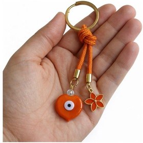 Resim Turuncu Örgü İpli Cam Kalp Nazar Boncuğu Ve Çiçek Figürlü Anahtarlık - Çanta Aksesuarı Turuncu 