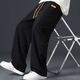 Resim Erkekler İçin Konforlu Gri Bol Kesim Jogger Pantolon - İp Detaylı Bel, Tüm Mevsimler İçin Uygun, Makinede Yıkanabilir Poliester Kumaş 