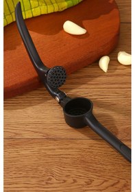 Resim Siyah Renk Ergonomik Sarımsak Ezici Pratik Paslanmaz Çelik Gövdeli Mutfak Aleti Siyah 