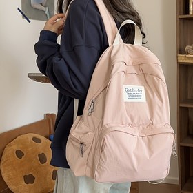Resim Kadınlar için Dayanıklı Naylon Sırt Çantası - Şık Üniversite Öğrencisi ve Seyahat Çantası Ön Kapaklı Cep, Ayarlanabilir Askılar ve Çoklu Bölmeler ile - Bej, Siyah, Pembe, Mavi renklerde mevcut 