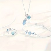 Resim Kadınlar İçin Şık Aytaşı Takı Seti - Kolye, Açık Yüzük ve Bileklikler Dahil, Zarif Mavi Yaprak Desenli, Hediye, Parti ve Günlük Kullanım İçin İdeal, Bohem Tarzı, Yüksek Kaliteli Taşlı Aksesuar, Moda Tutkunları için Dayanıklı 