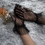 Resim Bir çift şeffaf siyah ve beyaz polka dot mesh eldiveni, bahar ve yaz için mükemmel, kulüp ve resmi etkinlikler için ideal. 