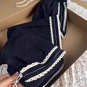 Resim Kadınlar İçin Siyah Kontrast Beyaz Dantel Detaylı Pantolon - Esnek Olmayan Makinede Yıkanabilir Kumaş, İlkbahar/Yaz Modası, Şık Ofis ve Günlük Kullanım için Zarif Dantel Detalları, Sevimli Pantolon 