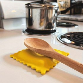 Resim 1 adet Karikatür Kurabiye Şekilli Silikon Kaşık Tutucu - Isıya Dayanıklı ve Yanmaz Mutfak Paspası, Ev ve Restoran Kullanımı İçin Uygun 