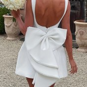 Resim Büyük Kurdele Detayı ve İnci Kenarlıklı Şık Beyaz Kolsuz A-Line Elbise - Kadınlar İçin Arka Peplum Prenses Stili, Kolsuz Moda|Şık A-Line Elbise|Zarif Tasarım 