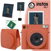 Resim Fujifilm Instax SQ1 Terracotta Fotoğraf Makinesi + 10'lu Kare Film + Deri Kılıf + Pleksi Çerçeve + Kıskaçlı Stand Turuncu 