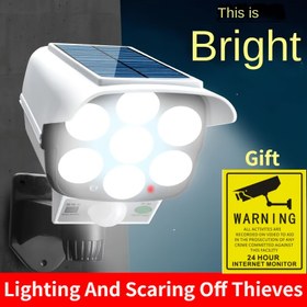 Resim Ultra Parlak Güneş Enerjili LED Bahçe Işığı - Hareket Sensörlü Duvar Lambası, 1600mAh Pil, 3 Mod, 77 SMD'ler, Sahte Kamera Akıllı Sokak Aydınlatması ile Kablosuz Dış Güvenlik Spotu, Taklit Gözetim, 1 Adet 