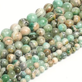 Resim Yeşil kalsit malzemeden yapılan 6, 8, 10 ve 12 mm boyutlarında gevşek araba boncukları, erkekler ve kadınlar için güzel takılar oluşturmak için mükemmeldir. Bilezikler, kolyeler ve küpeler gibi 