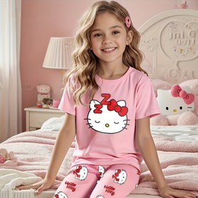 Resim Kızlar için Sevimli Pembe Pijama Takımı - Kısa Kollu Üst ve Uzun Pantolon ile Karikatür Tasarımı, Yuvarlak Yaka, Normal Beden - Mükemmel Yazlık Pijama ve Rahat Giyim, Kızlar için Pijama 