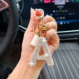Resim Şık, Işıltılı Rhinestone Harfli, Sevimli Arı Uçlu ve Püsküllü Araba Anahtarlığı - Kadınlar için Yaratıcı Harf Tasarımlı, Araba Anahtarları, Ev Anahtarları ve Dekorasyon için Uygun, Şık Araba Anahtarlık. 