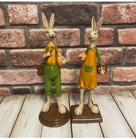 Resim Sepette Yumurta Taşıyan Kadın Ve Erkek Tavşan Çift 