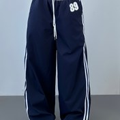 Resim Kadınların Beli Düşük Çizgili Jogger Pantolonları - Rahat Renk Blok Tasarımı, Tüm Mevsimler İçin Rahat, Konforlu Giyim | Trendy Jogger Pantolonları | Pürüzsüz Dokulu Kumaş 
