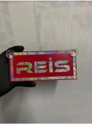 Resim Kırmızı Renk Üzeri Hologram Renk Reis Yazılı Vantuzlu Cam Süsü 