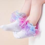 Resim Kızlar için büyük çiçek desenli bir çift çorap, prenses dansı için tasarlanmış. 
