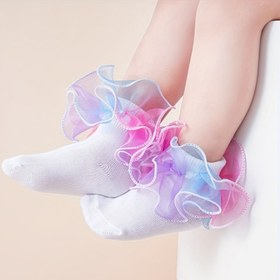 Resim Kızlar için büyük çiçek desenli bir çift çorap, prenses dansı için tasarlanmış. 