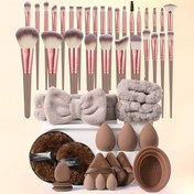 Resim 48 parça makyaj aletleri seti İçerir: 30 adet makyaj fırçası seti + 6 adet makyaj süngeri + 3 adet üçgen pudra ponponu + 3 adet mini hava yastığı pudra ponpu + 2 adet yüz temizleme süngeri + 1 adet saç bandı + 2 adet el kasesi kayışı + 1 adet makyaj fırçası temizleme aracı 