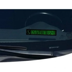 Resim Toptancı Kapında Araç İçi Fosforlu Telefon Plakası 