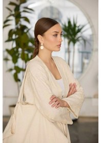 Resim Şıklık Ve Konforun Mükemmel Uyumu: Krem İşlemeli Kimono İle Tarzınızı Baştan Yaratın Krem 