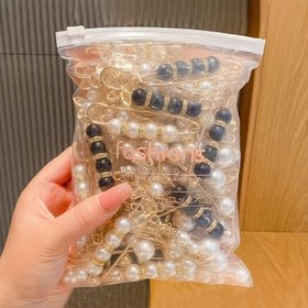 Resim 20 adet/set (Stiller ve Boyutlar Karışık Rastgele) Çeşitli Boyut Kombinasyonu Seti Rastgele Paketlenmiştir. Bel Düpleri Bel Boyutunu Ayarlamak İçin, Giysileri Güvenlemek İçin Çok Fonksiyonlu Klipsler, Askılar, Etekler ve Anti-Çıkma Pantolon Klipsleri İçin Uygun. Günlük Giyim ve Hediye Olarak Uygundur. 