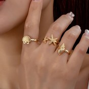 Resim Kadınlar için 3 adet Boho Chic Yüzük Seti - Yıldız Balığı, Deniz Kabuğu ve Haliç Tasarımları, Altın Tonlu Çinko Alaşımı - Plaj Tatilleri, Günlük Giyim ve Sevgililer Günü Hediyeleri için Mükemmel, Tatil Aksesuarları|Boho Chic Stil|Altın Tonlu Kaplama 