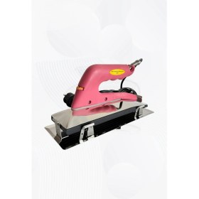 Resim Pembe Halı Kaynak Ütüsü, Şık ve Kullanışlı Ev Dekoru Için Ideal Seçim 