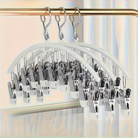 Resim Bu Pantolon Askısı 4 Renkte Mevcuttur ve 10 Klips ile Donatılmıştır. Dayanıklı ve Dayanıklı, Rahat Tutma ve Rüzgar Geçirmez Giyim Depolama için Tasarlanmıştır. Pantolon, Etek, Sütyen, Atkı, İç Çamaşırı için Uygun ve Yatak Odaları, Balkonlar, Yurtlar ve Dolaplar için Temel Alan Tasarrufu Elemanıdır. 