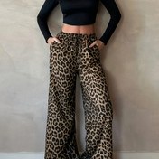 Resim Kadınlar İçin Seksi Leopar Desenli Geniş Paça Pantolon - Cesur Hayvan Deseni, Makinede Yıkanabilir, Her Mevsim Rahatlık, Günlük ve Resmi Kıyafetler için, Şık Alt Giyim, Akıcı Kumaş, Konforlu Kesim, Çok Yönlü Moda, Nefes Alabilen Malzeme, Trend Aksesuar 