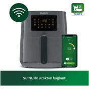 Resim Yüksek Teknolojili Beyaz Airfryer, Sağlıklı ve Pratik Pişirme Deneyimi 