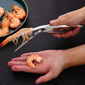 Resim 1'li Paket Paslanmaz Çelik Balık Oyma Karides Soyucu Alet - Kabuk Çıkarmayı Kolaylaştıran Ergonomik Tasarım, Karides, Yengeç & Istakoz için Dayanıklı Mutfak Gereci - Profesyonel ve Ev Şefi İçin Temel, Deniz Ürünleri Hazırlama, Şık Metalik Yüzey, Rahat Tutma Sapı 