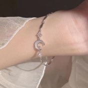 Resim Şık ve Güzel Yıldız ve Ay Tasarımlı Moda Bilezik, Sentetik Zirkon Taşlı, Günlük Kullanım İçin Uygun ve Arkadaşlara veya Sevgililere Hediye Olarak Takı Aksesuarları 