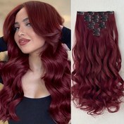 Resim Siyah-Kahverengi Sentetik Saç Ekleri, 16 Klipsli, 55.88-60.96 cm Uzunlukta, Su Dalgası Stili. Bu Set 7 parçadan oluşur ve kadınlar için tam baş görünümü için mükemmeldir. 