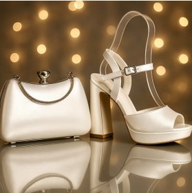 Resim E&L Company Net 10cm Kırık beyaz deri. Çantasıyla birlikte takımdır 