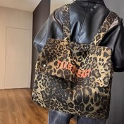 Resim Denim Esinli Tasarımlı Büyük Kapasiteli Leopar Desenli Kanvas Sırt Çantası, Ayarlanabilir Askılar - Şık "TAKE EAST" Grafikli Seyahat & Öğrenci Çantası, Seyahat Sırt Çantası 