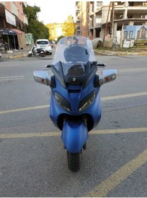 Resim Motocam Suzuki Burgman 650 Siperlik Ön Cam 2005 2018 Model 65cm Şeffaf Renkli 4mm Orta Boylu Cam 