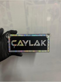 Resim HBSİ SİYAH RENK ÜZERİ HOLOGRAM RENK ÇAYLAK YAZILI VANTUZLU CAM SÜSÜ 