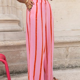 Resim Kadınların Elastik Bel ve Cep Detaylı Geniş Bacaklı Pembe Yırtmaçlı Pantolonları - Ofis, İş, Günlük ve Seyahat Giyiminde Mükemmel Polyester Kumaş, Rahat ve Şık Pantolonlar 