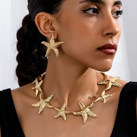 Resim Kadınlar için Altın Tonlu Yıldız Balığı Kolye ve Küpeler Seti - Boho Chic 3 Parça Okyanus İlhamlı Metal Yıldız Balığı Takı Seti - Günlük Kullanım ve Tatil için İdeal 