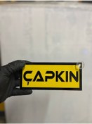 Resim Sarı Renk Üzeri Siyah Renk Çapkın Yazılı Vantuzlu Cam Süsü 