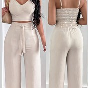Resim Kadınların Şık Pembe İki Parça Kıyafeti - Kolsuz Üst ve Geniş Bacaklı Pantolon, Polyester, Bahar/Yaz İçin Mükemmel, Rahat Kıyafet, Rahat Kıyafet|Şık İki Parça Takım|Polyester Kumaş 