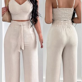 Resim Kadınların Şık Pembe İki Parça Kıyafeti - Kolsuz Üst ve Geniş Bacaklı Pantolon, Polyester, Bahar/Yaz İçin Mükemmel, Rahat Kıyafet, Rahat Kıyafet|Şık İki Parça Takım|Polyester Kumaş 