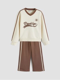 Resim LC Waikiki Ekru Brooklyn Baskılı Kız Çocuk Sweatshirt ve Eşofman Altı 