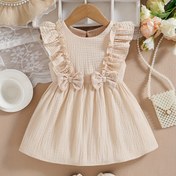 Resim Bebe Kızın Kolsuz Ruffled Elbisesi, Kurdele Detayı ile - Yumuşak Bej Yaz Elbisesi, Bebekler ve Küçük Çocuklar için, Doğum Günleri, Tatiller ve Okul için Rahat ve Konforlu Kıyafet, Bebe Kız Elbisesi, Tatil Bebek Giyimleri, Rahat Küçük Çocuk Giyimleri, Dış Mekanlar için Mükemmel 