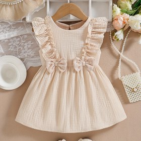 Resim Bebe Kızın Kolsuz Ruffled Elbisesi, Kurdele Detayı ile - Yumuşak Bej Yaz Elbisesi, Bebekler ve Küçük Çocuklar için, Doğum Günleri, Tatiller ve Okul için Rahat ve Konforlu Kıyafet, Bebe Kız Elbisesi, Tatil Bebek Giyimleri, Rahat Küçük Çocuk Giyimleri, Dış Mekanlar için Mükemmel 