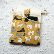 Resim 1 adet Oynak Kedi A5 Tuval Kitap Çantası - Ön Cep ile Yıkanabilir ve Dayanıklı, Sevimli Sarı Kedi Tasarımı, Kitap Sevgilileri için Mükemmel, Kitap Cove 