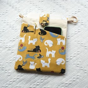 Resim 1 adet Oynak Kedi A5 Tuval Kitap Çantası - Ön Cep ile Yıkanabilir ve Dayanıklı, Sevimli Sarı Kedi Tasarımı, Kitap Sevgilileri için Mükemmel, Kitap Cove 